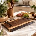 Personalized live edge walnut serving tray with black metal handles
Handcrafted walnut charcuterie serving tray on marble countertop
Live edge walnut serving board for entertaining
Wooden serving tray with black handles and charcuterie spread
Engraved walnut serving tray made in Texas
Premium walnut serving platter with natural live edge
Personalized charcuterie tray for home entertaining
Solid walnut serving tray with custom laser engraving